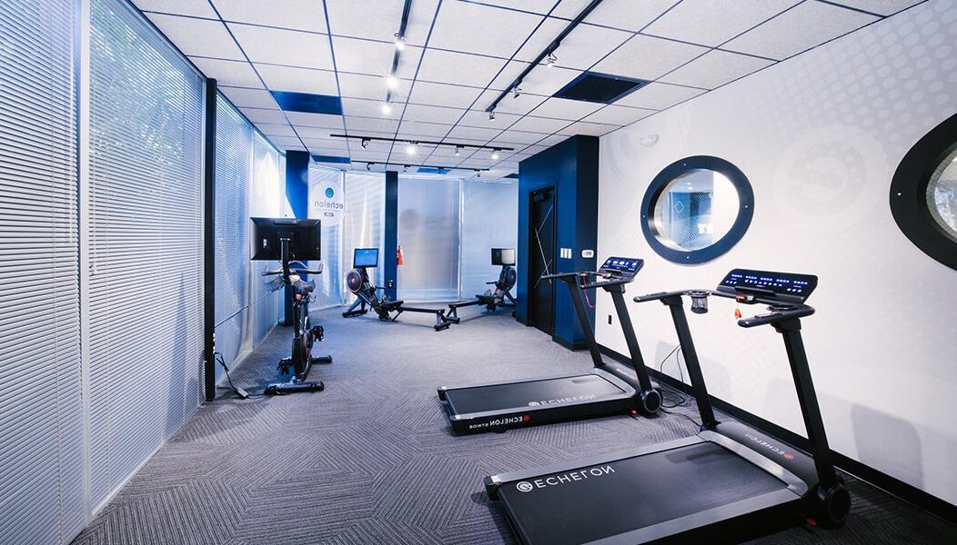 Equipment from Echelon including two treadmills, two rowing machines, and an exercise bike in the Fitness Technology Lab.